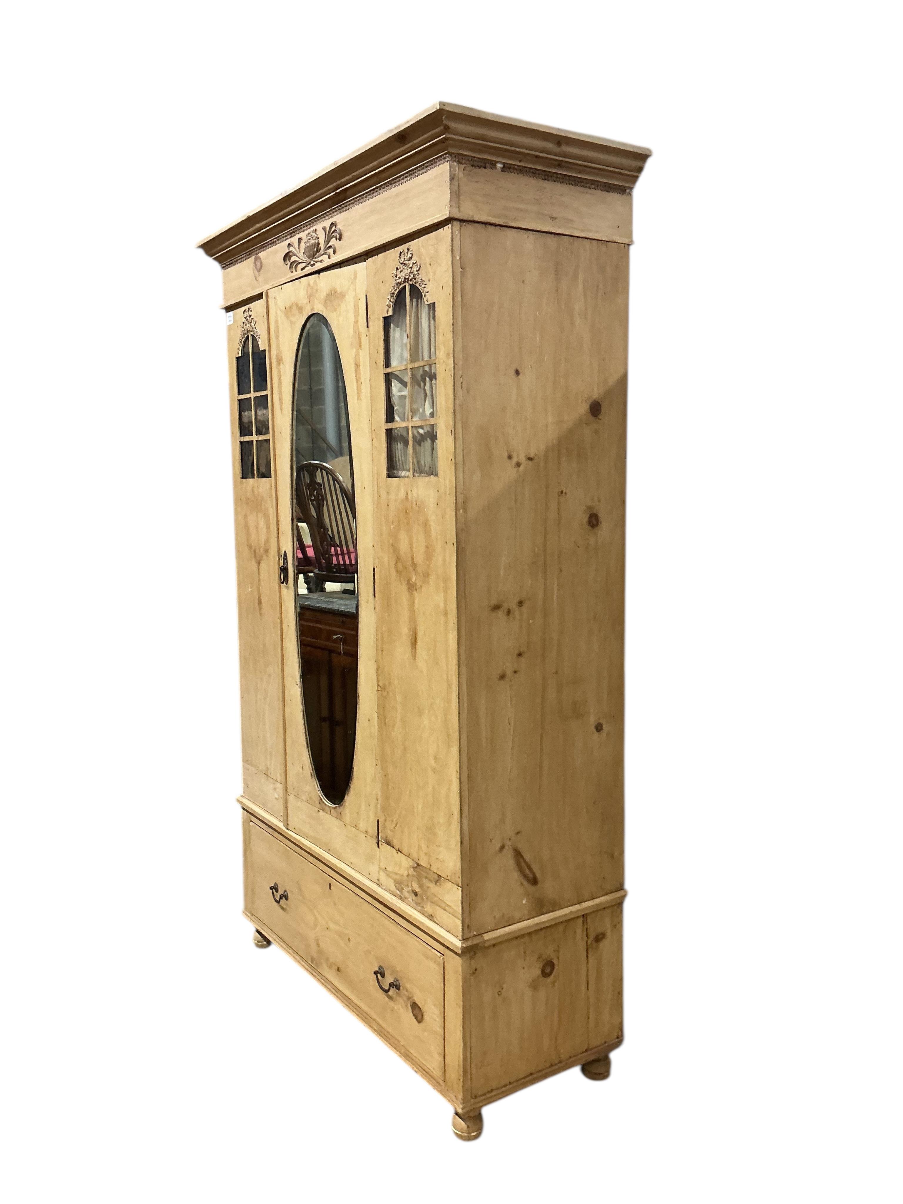 A late 19th century Continental pine wardrobe, width 124cm, depth 51cm, height 200cm